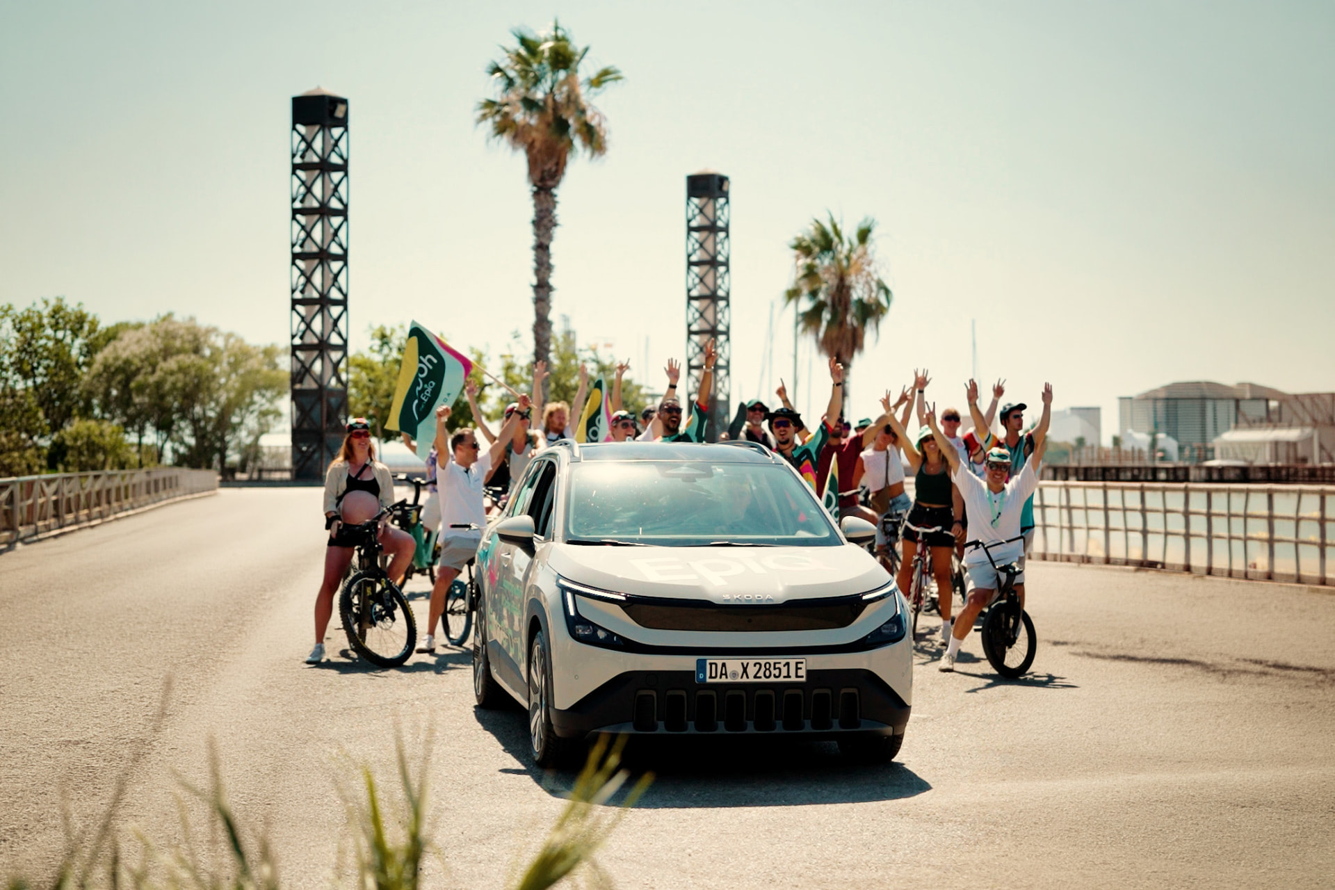 Škoda Epiq leading a group of cyclists in Barcelona