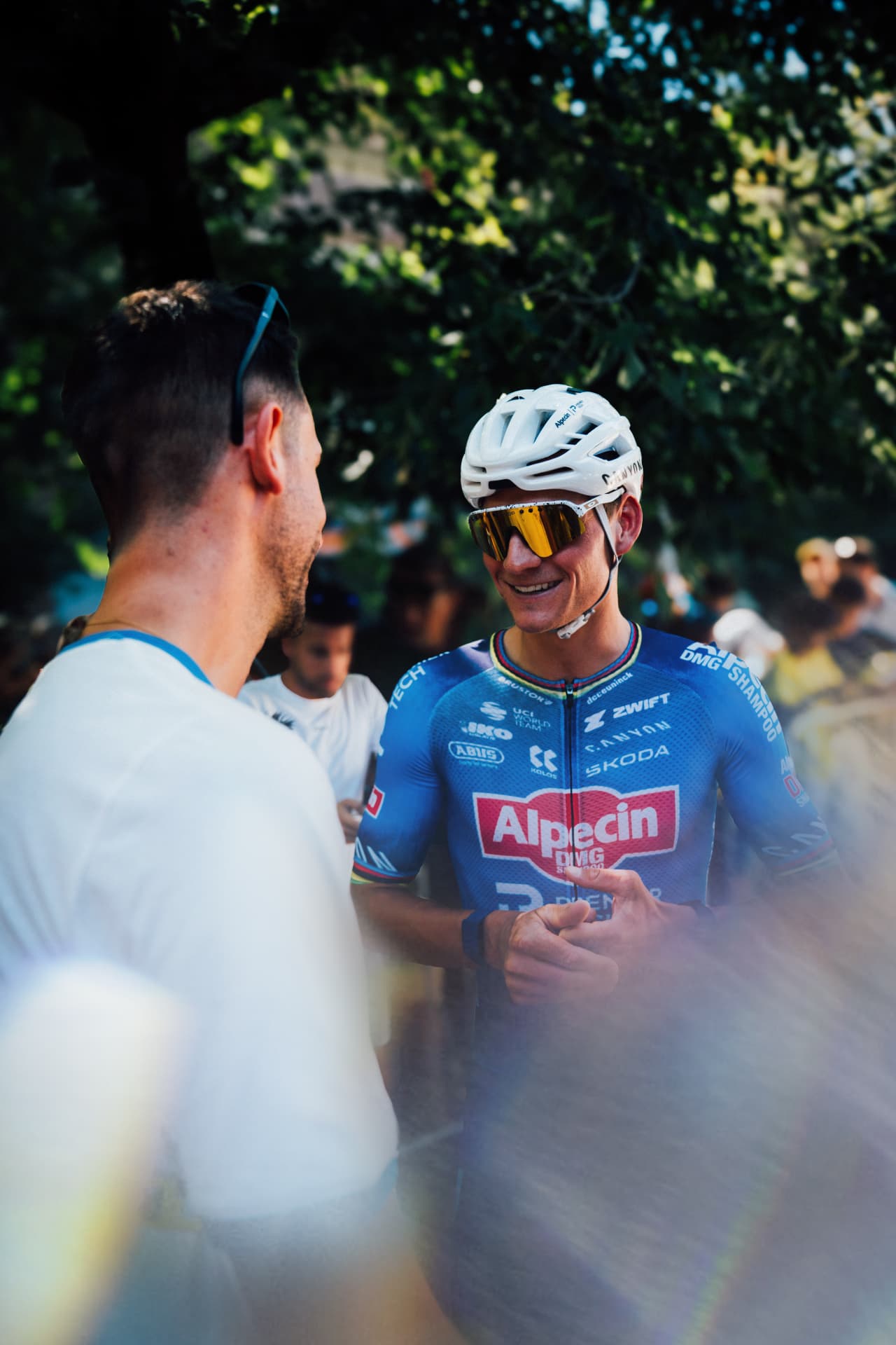 Riders and fans roadside at the Tour